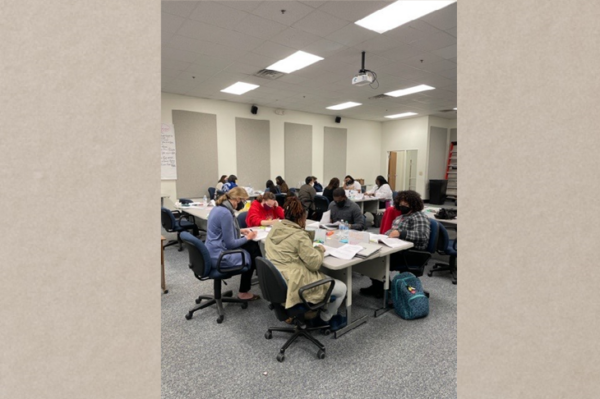 tables of teachers collaborating on PD